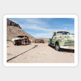 Old abandoned trucks and cars in Arizona desert Sticker